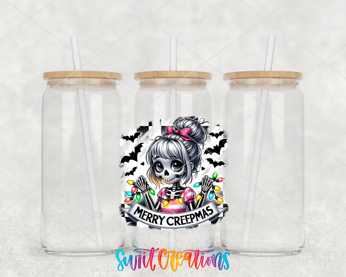 Merry Creepmas skeleton girl UV DTF transfer on three clear glass cans