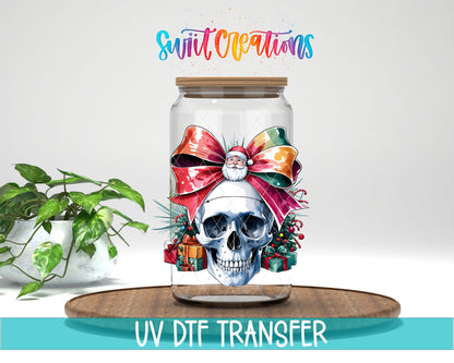 Christmas Croquette Skull UV DTF transfer on a clear glass can with a teal UV DTF Transfer banner