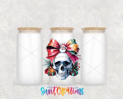 Christmas Croquette Skull UV DTF transfer on three frosted glass cans on a white background