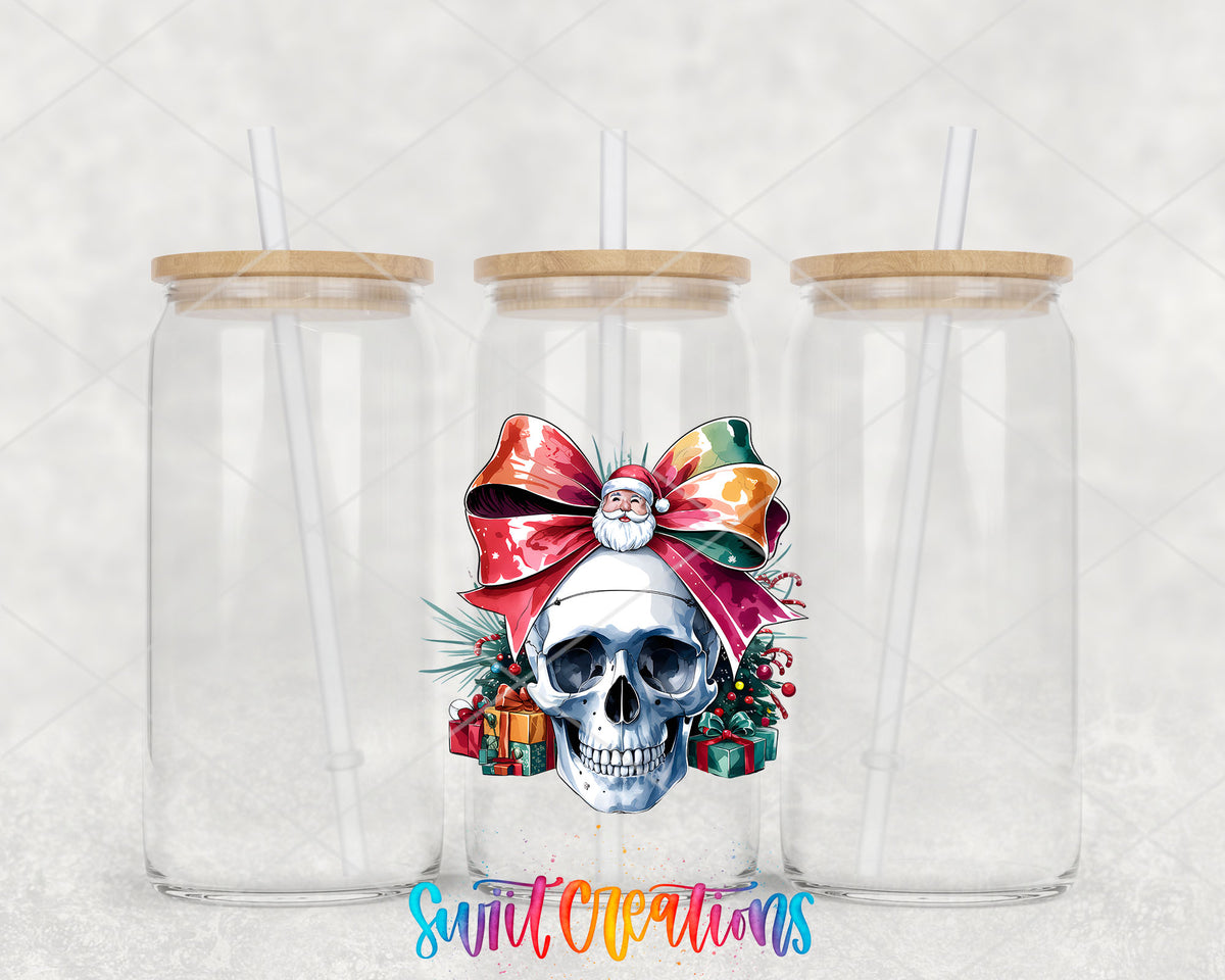 Christmas Croquette Skull UV DTF transfer on three clear glass cans