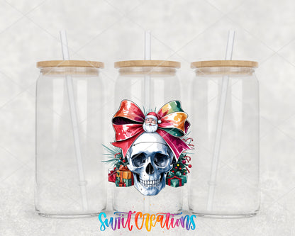 Christmas Croquette Skull UV DTF transfer on three clear glass cans