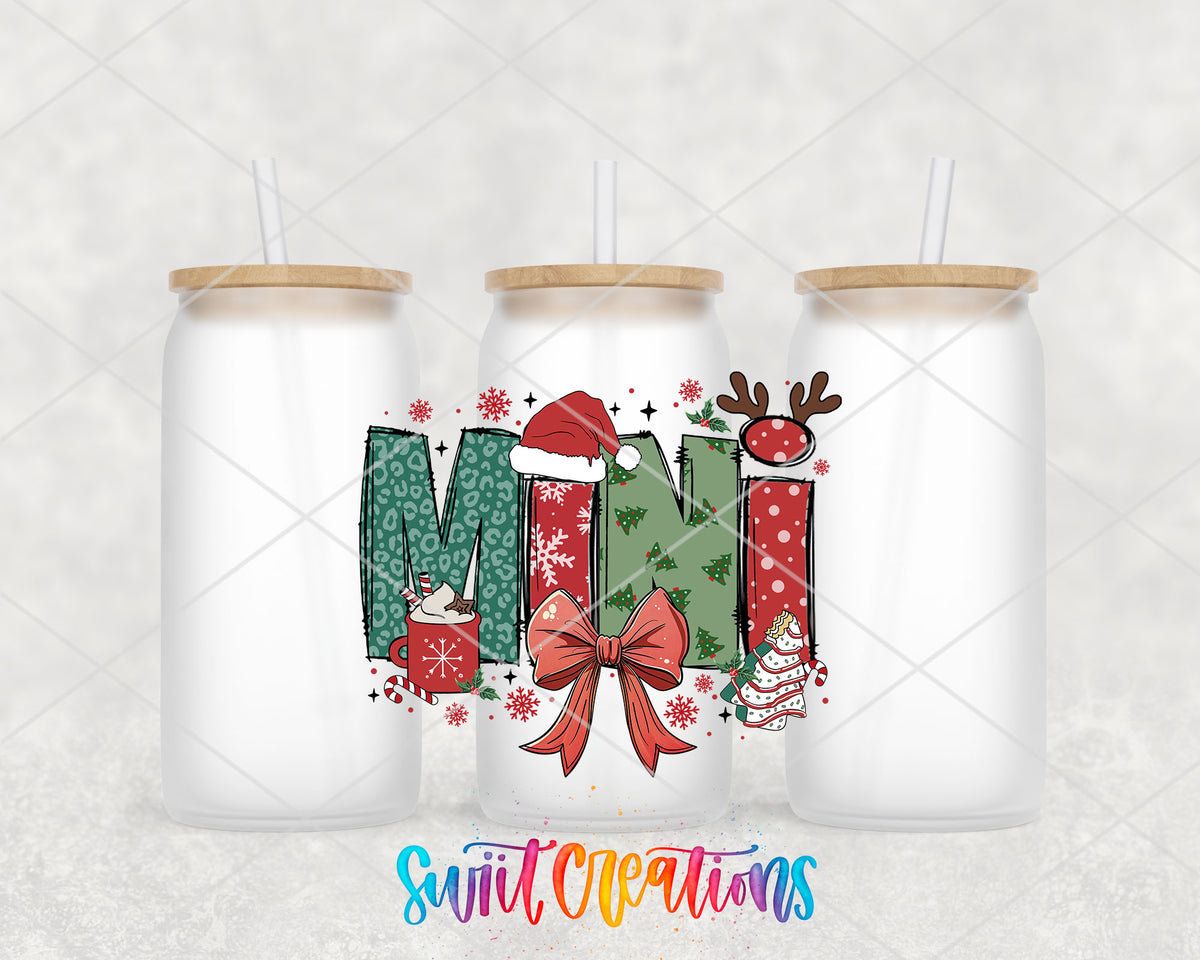 Mini Christmas UV DTF transfer on three frosted glass cans on a white background