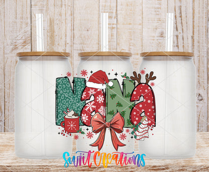 Nana Christmas UV DTF transfer on three frosted glass cans on a wood background
