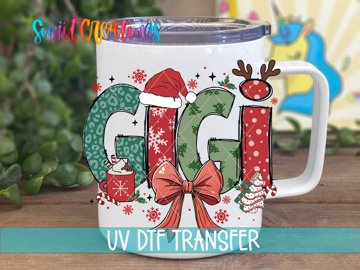 Gigi Christmas UV DTF transfer on a white stainless steel mug