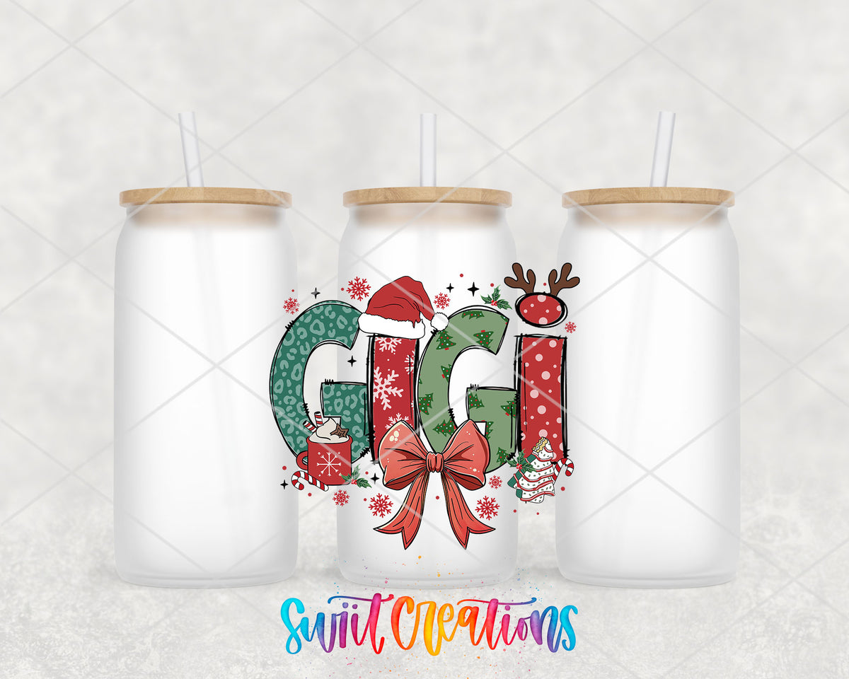 Gigi Christmas UV DTF transfer on three frosted glass cans on a white background