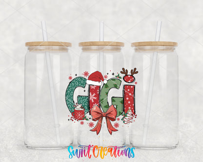 Gigi Christmas UV DTF transfer on three clear glass cans