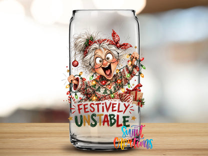 Close-up of the Festively Unstable grandma UV DTF transfer on a clear glass can