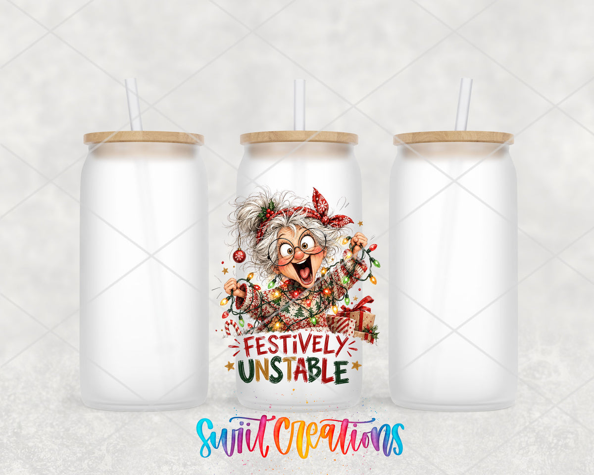 Festively Unstable grandma UV DTF transfer on three frosted glass cans on a white background