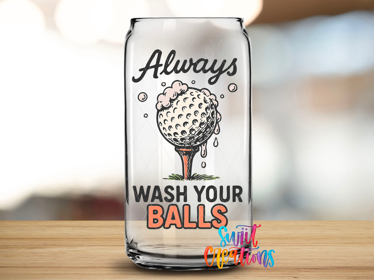 Close-up of the Always Wash Your Balls UV DTF transfer on a clear glass can