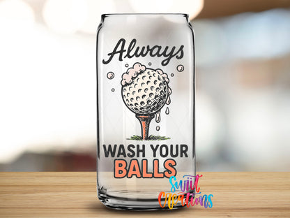 Close-up of the Always Wash Your Balls UV DTF transfer on a clear glass can