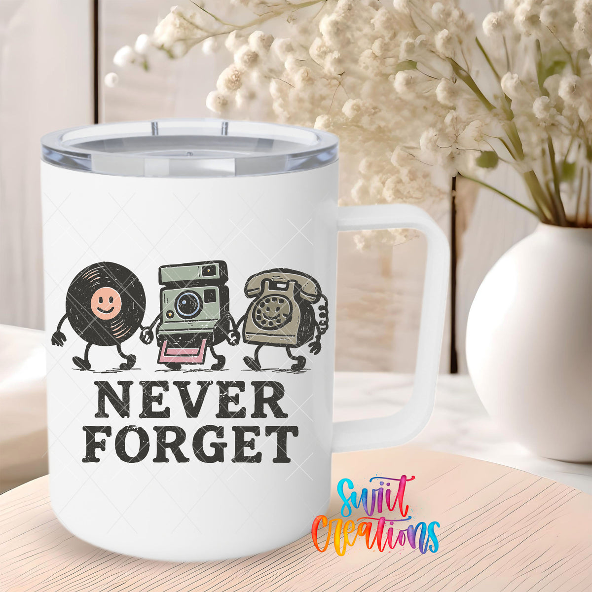 Never Forget UV DTF transfer on a 12 oz white stainless steel mug with a clear lid