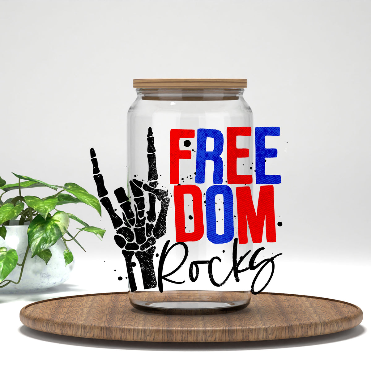 Freedom Rocks UV DTF transfer on a clear glass can