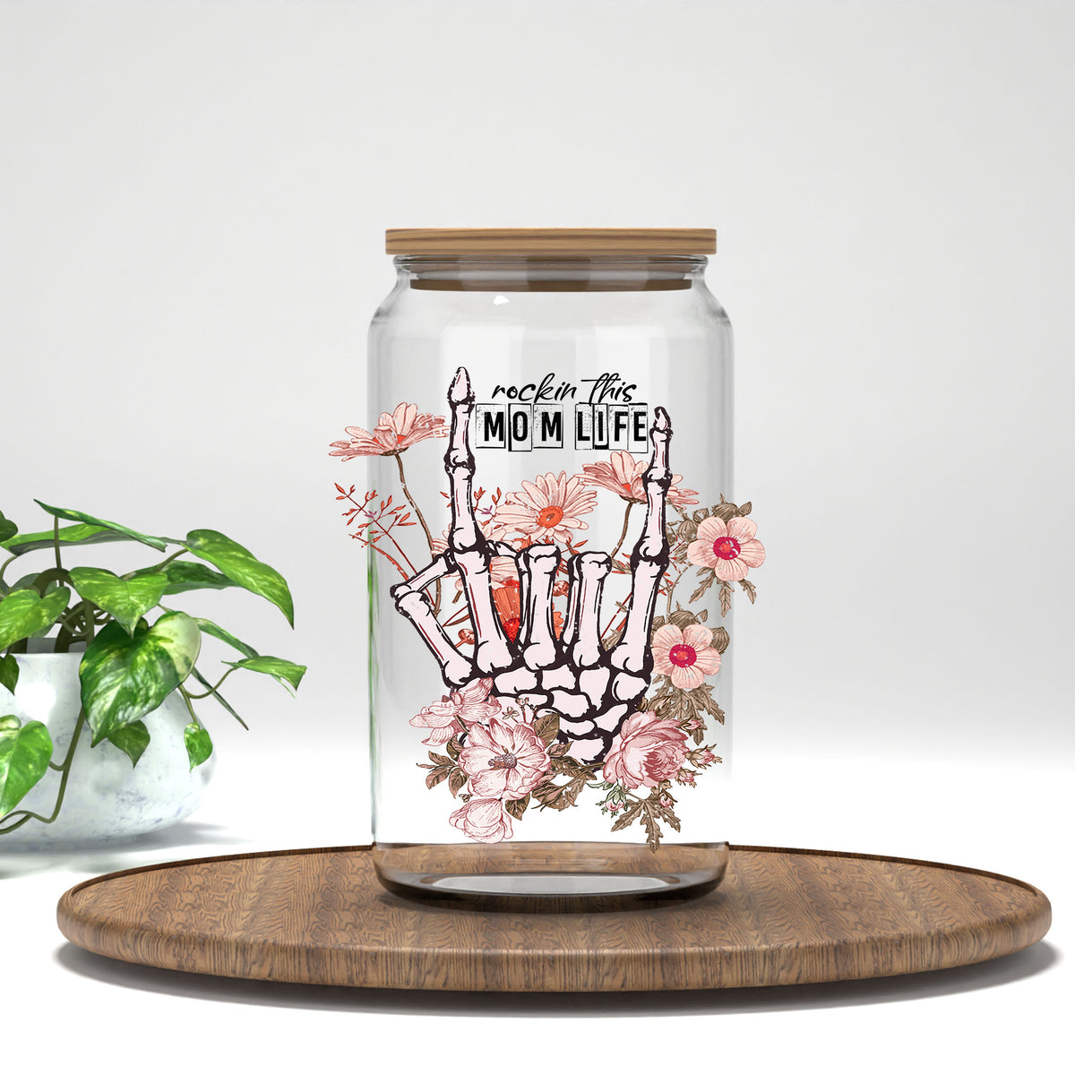 Rockin' the Mom Life UV DTF transfer on a clear glass can