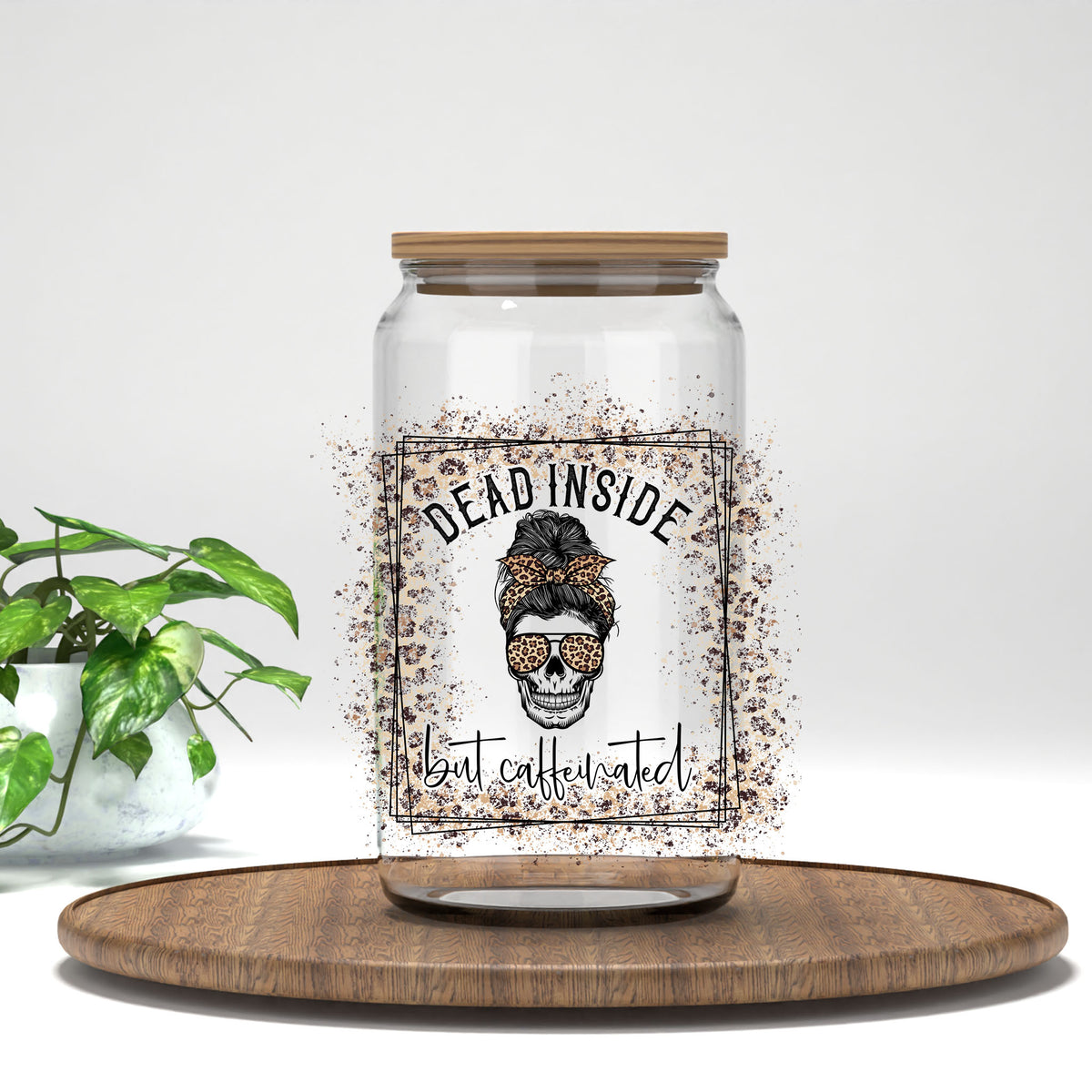 Dead Inside But Caffeinated leopard messy bun skull UV DTF transfer on a clear glass can
