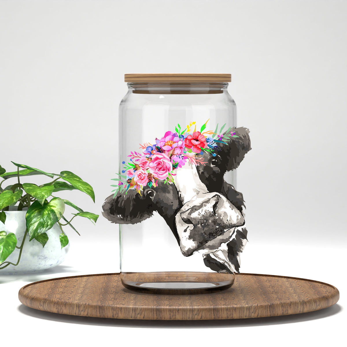 Pink Floral Cow UV DTF transfer on a clear glass can