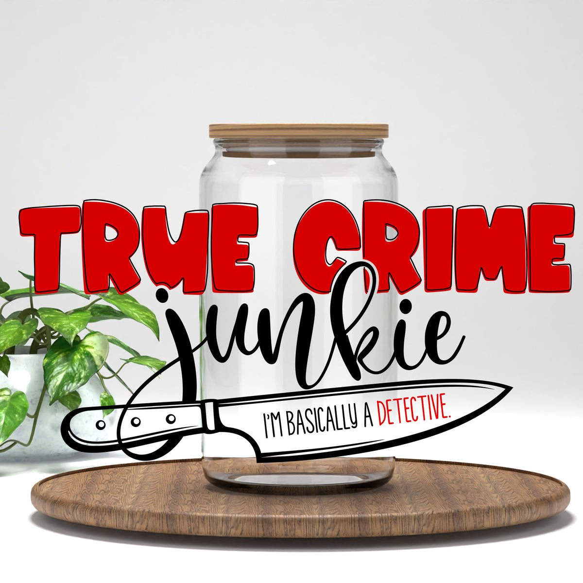 True Crime Junkie UV DTF transfer on a clear glass can