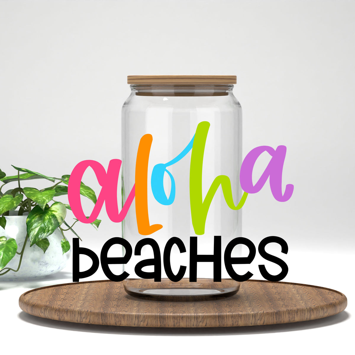 Aloha Beaches UV DTF transfer on a clear glass can