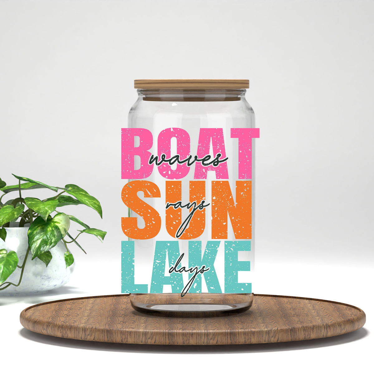Boat Sun Lake UV DTF transfer on a clear glass can