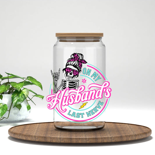 On My Husband's Last Nerve pink messy bun skeleton UV DTF transfer on a clear glass can