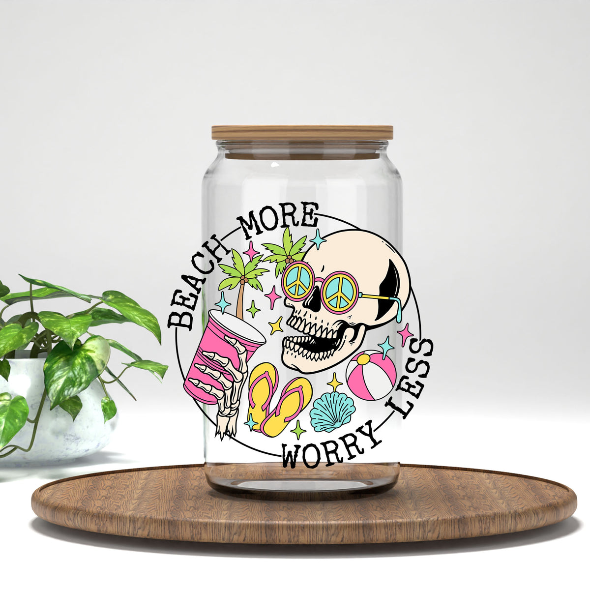 Beach More Worry Less skeleton in sunglasses UV DTF transfer on a clear glass can