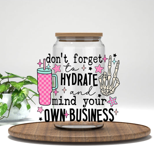 Hydrate and Mind Your Own Business UV DTF transfer on a clear glass can