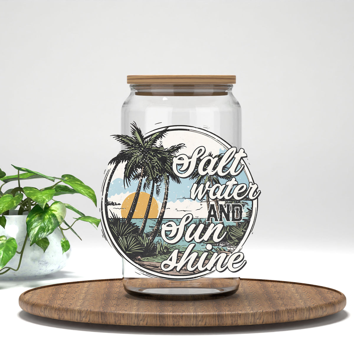 Salt Water and Sunshine vintage beach circle UV DTF transfer on a clear glass can
