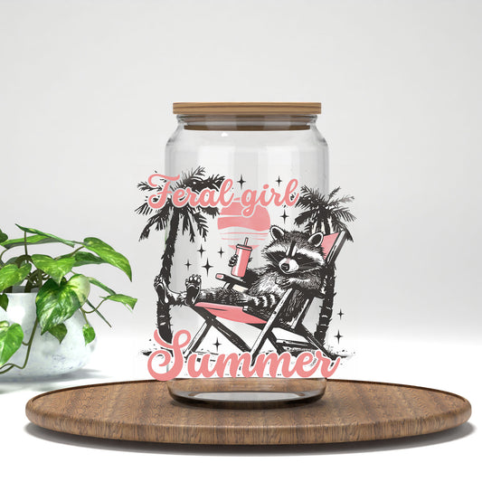 Feral Girl Summer raccoon in a beach chair UV DTF transfer on a clear glass can