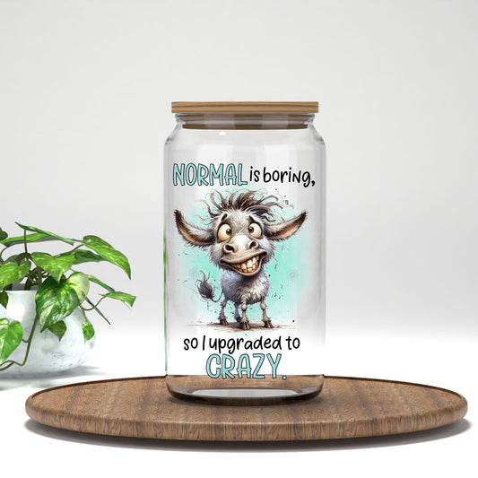 Normal Is Boring UV DTF transfer on a clear glass can