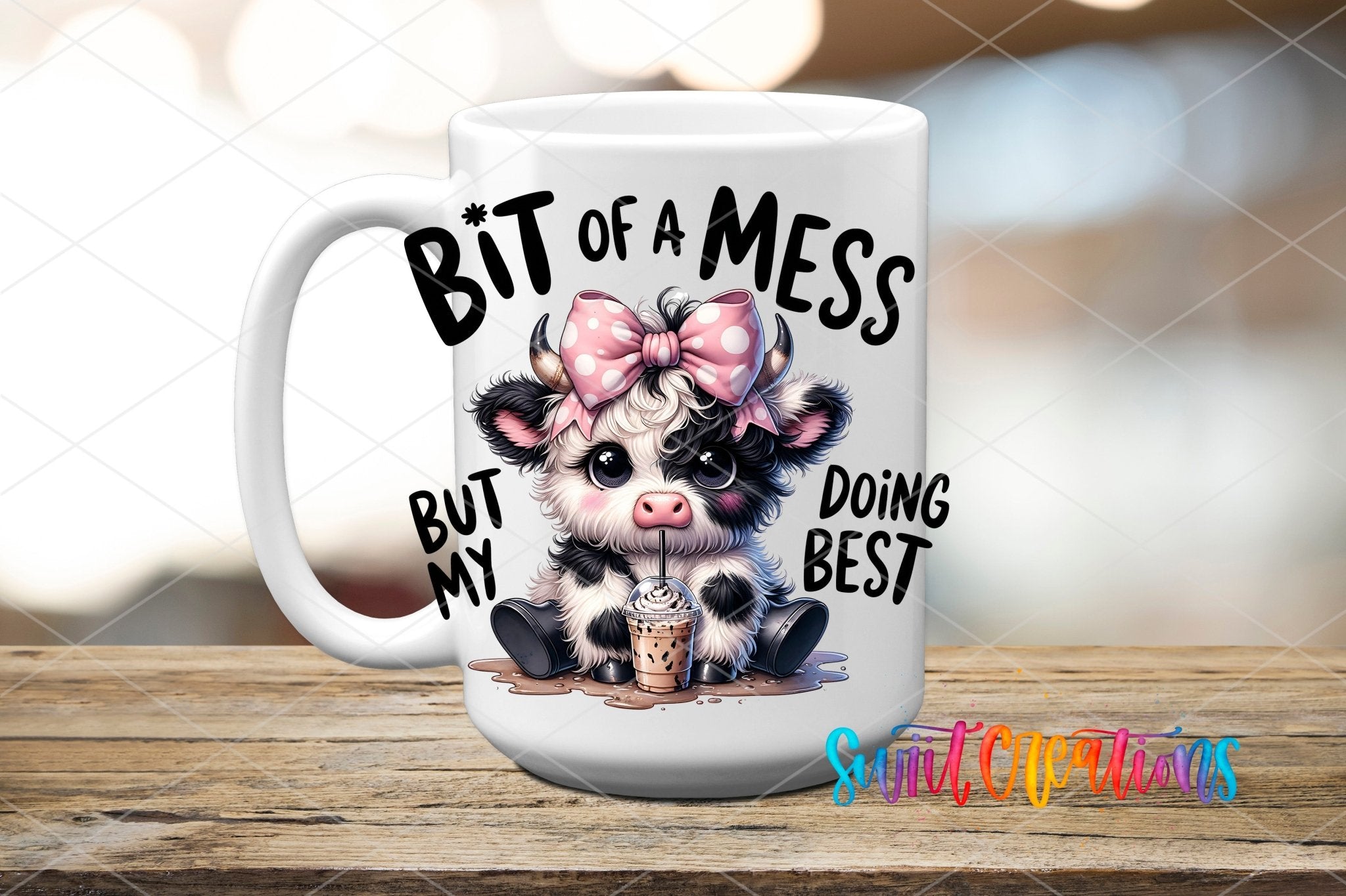 A Bit of A Mess But Doing My Best Cute Cow UV DTF transfer displayed on a white ceramic mug from Swiit Creations