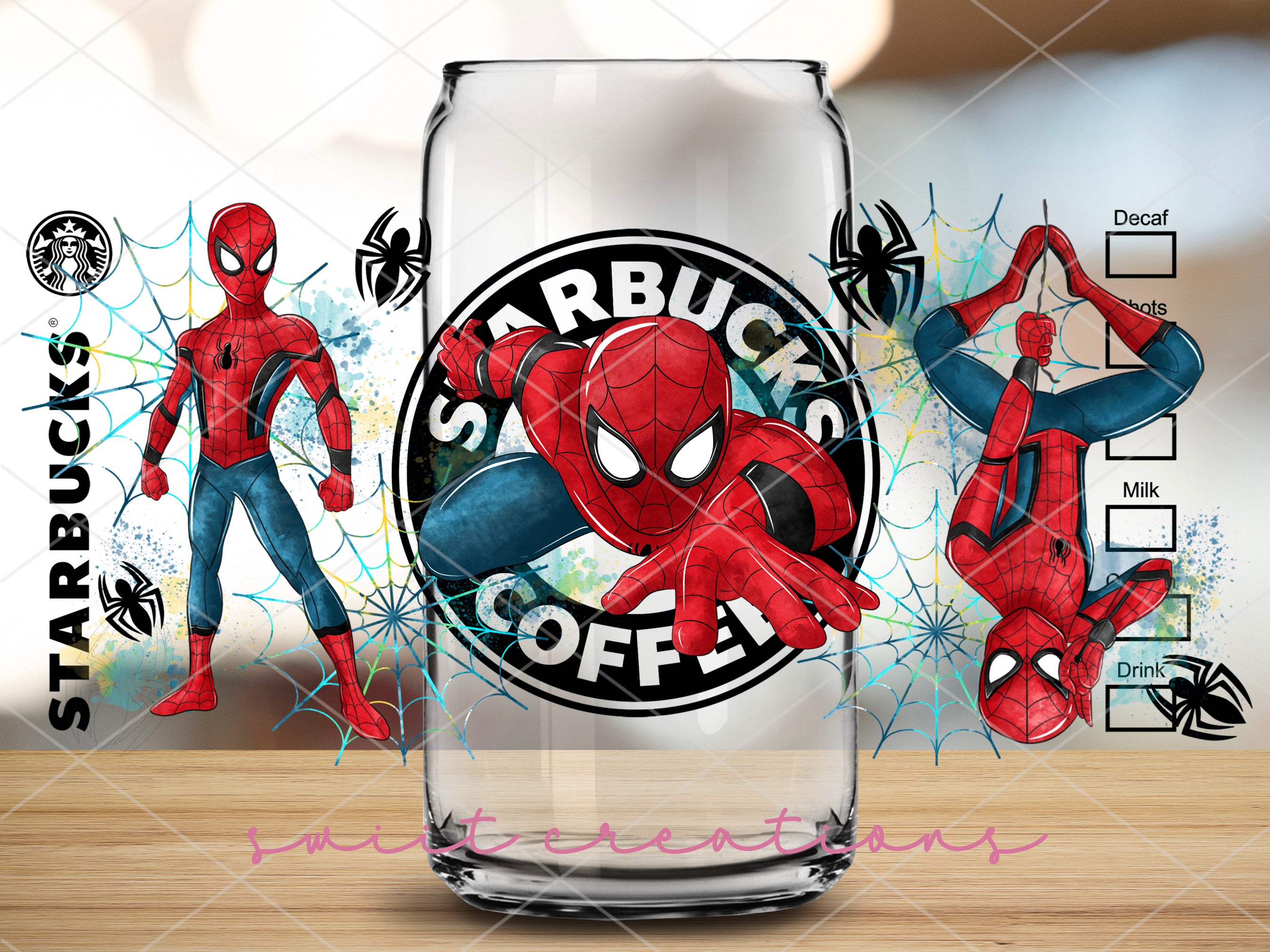 a glass with a picture of a spider man on it