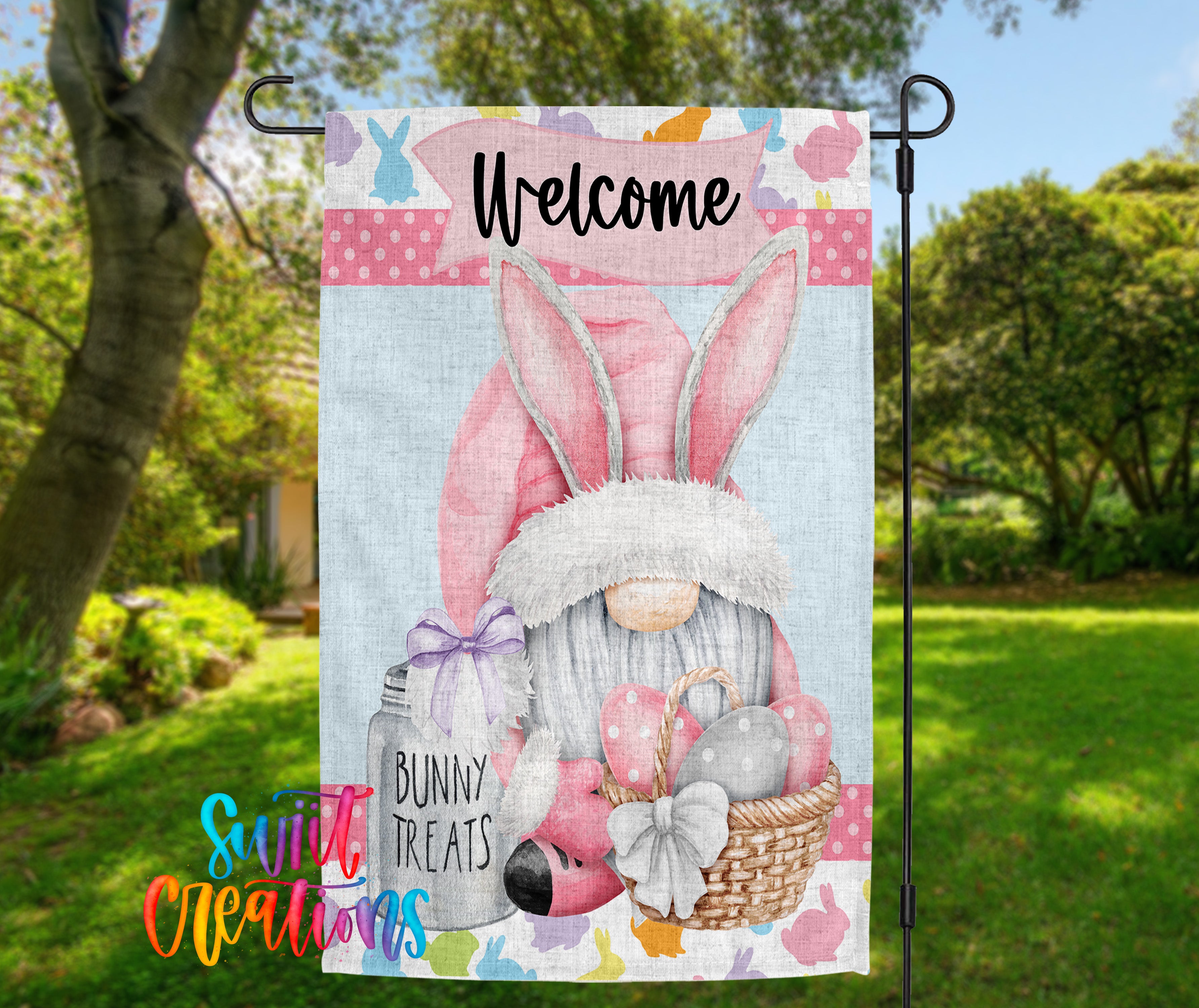 A colorful garden sign featuring a bunny gnome holding a jar of treats and Easter eggs, with the text "Welcome" and "Bunny Treats" displayed.
