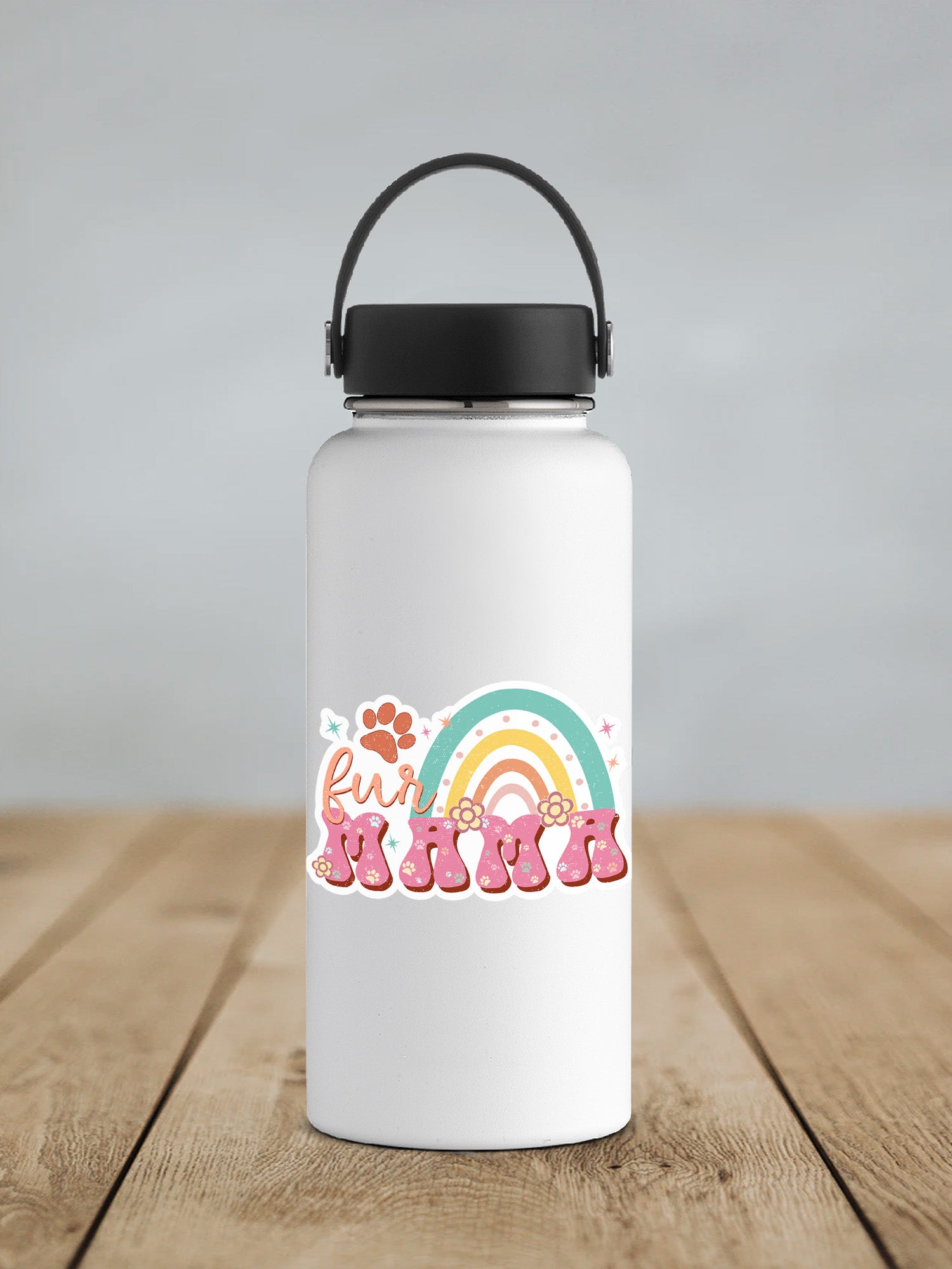 a white water bottle with a black lid on a wooden table