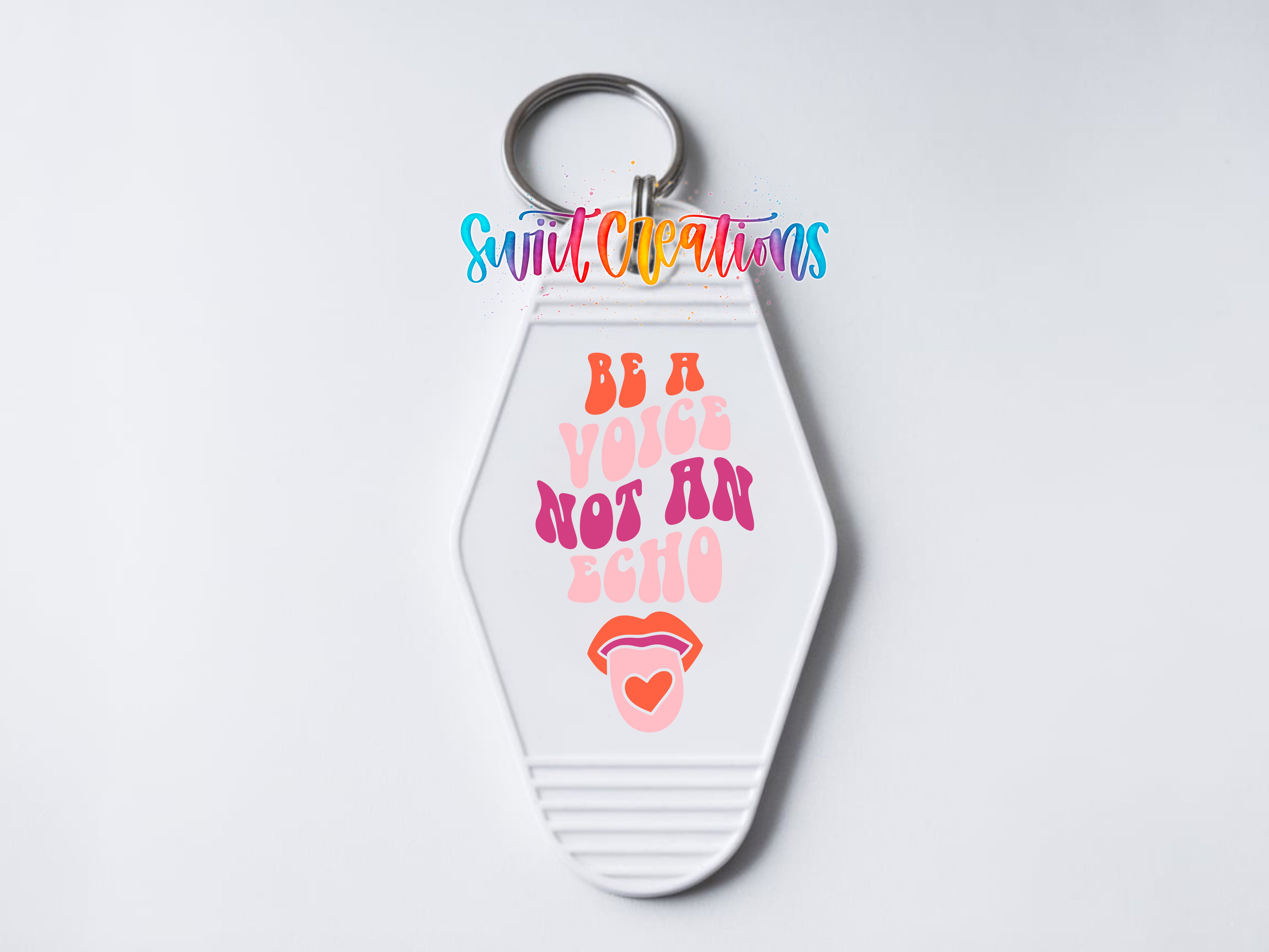 A keychain with a message that says "Be a voice not an echo" and a graphic of a tongue sticking out.