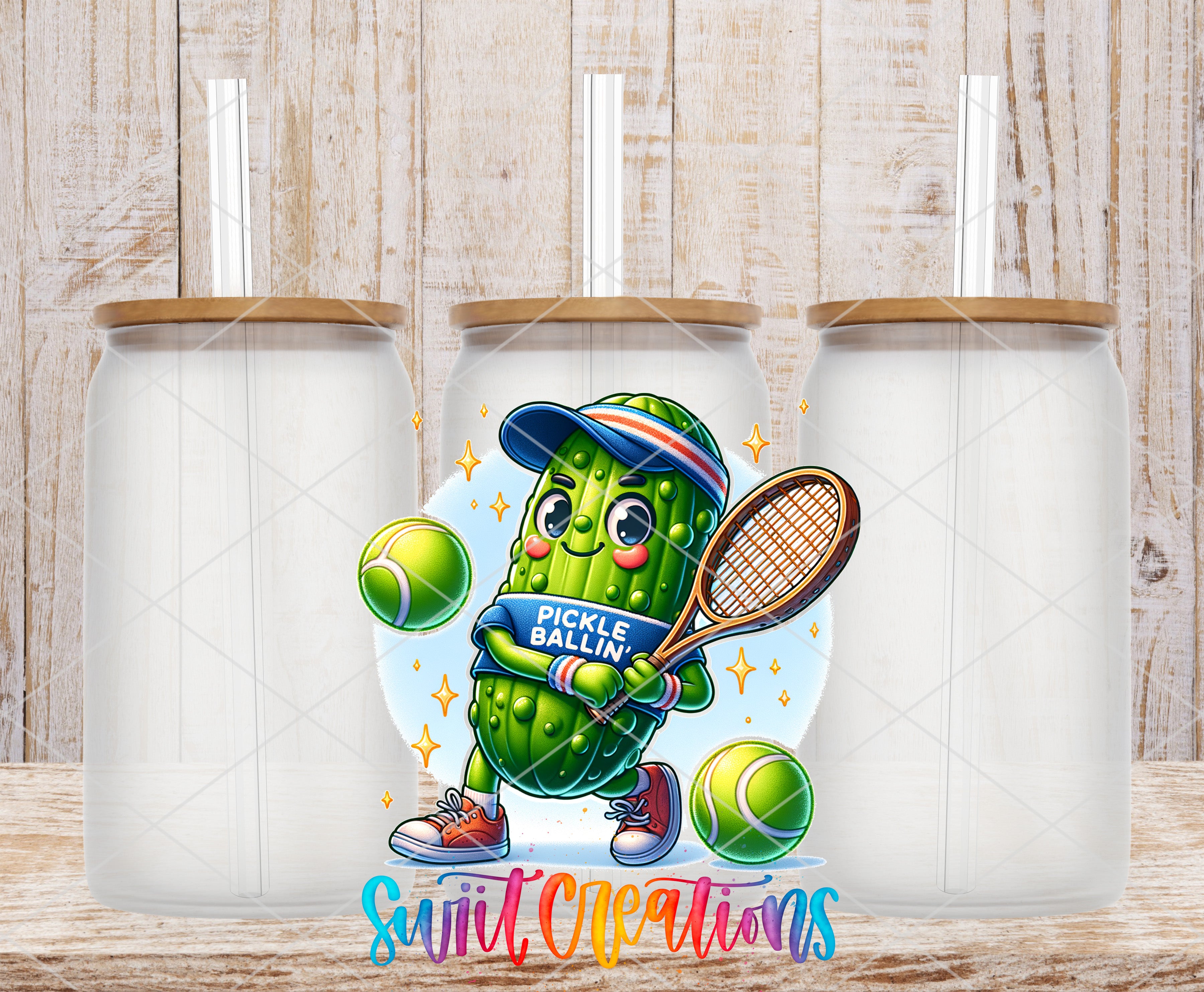 A cartoon pickle wearing a baseball cap and holding a tennis racket, surrounded by tennis balls, with a sign that says "Pickle Ballin".