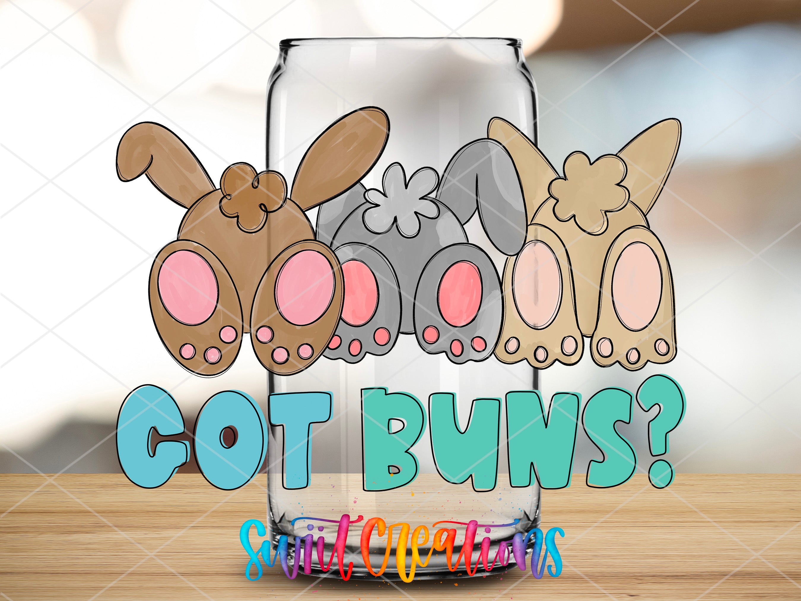 a glass with a picture of three bunnies and the words got bunnies?