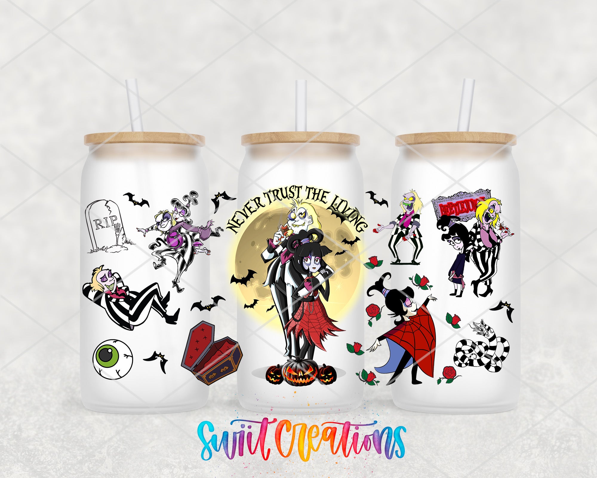 a set of three tumbles with cartoon characters painted on them