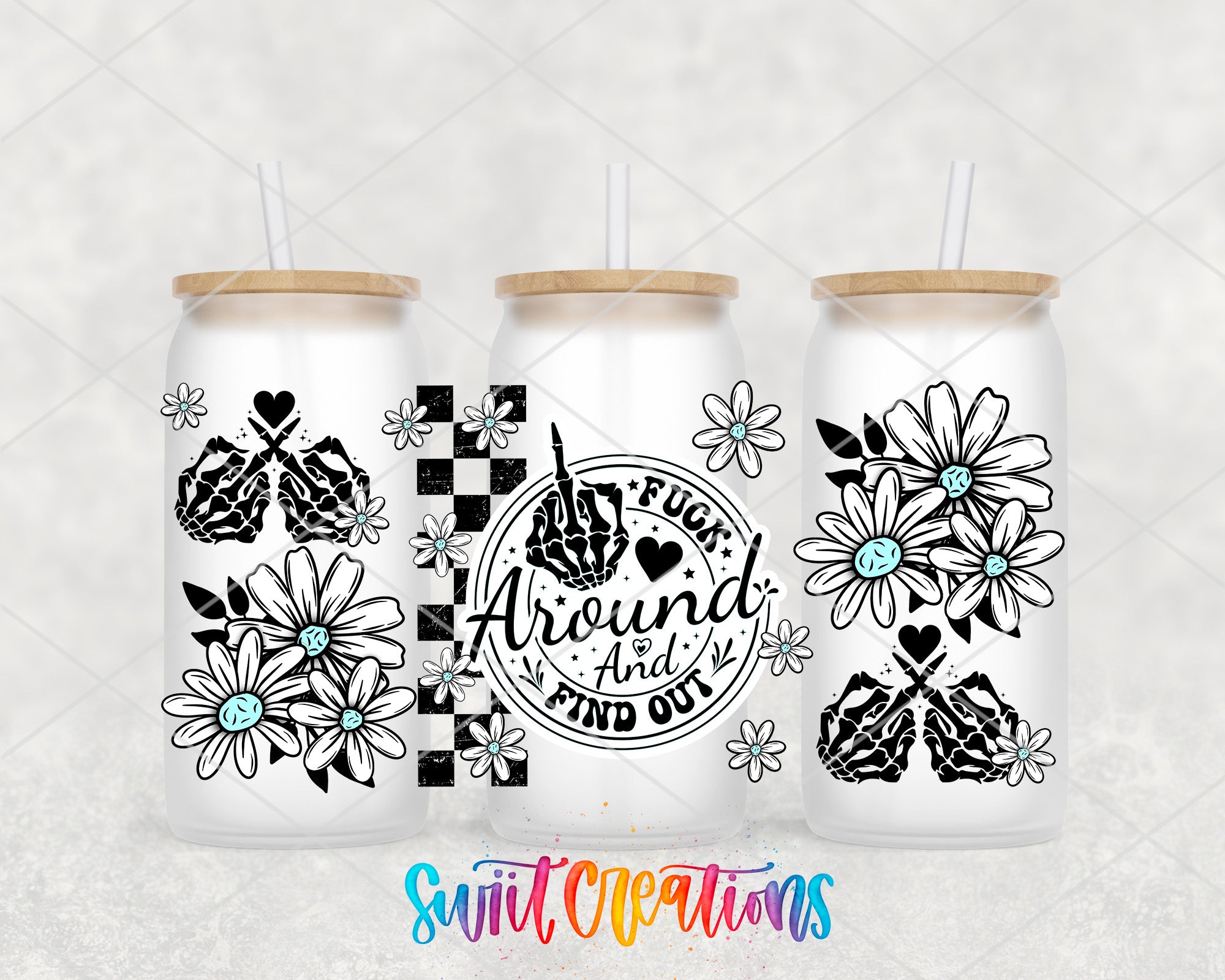 two white mason jars with black and white designs