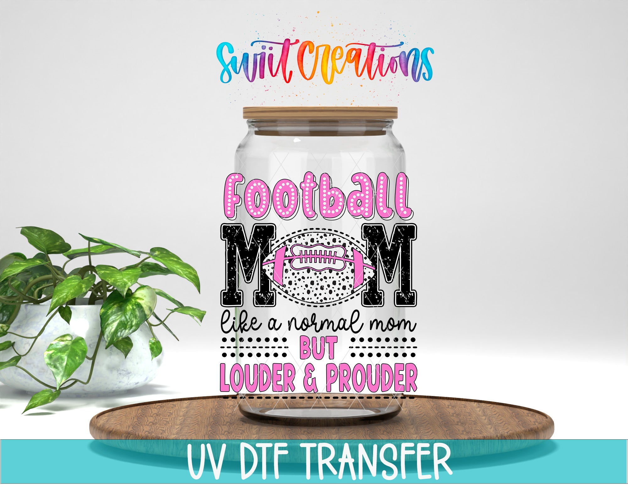 A glass jar with a football design and text printed on it, placed on a wooden surface.
