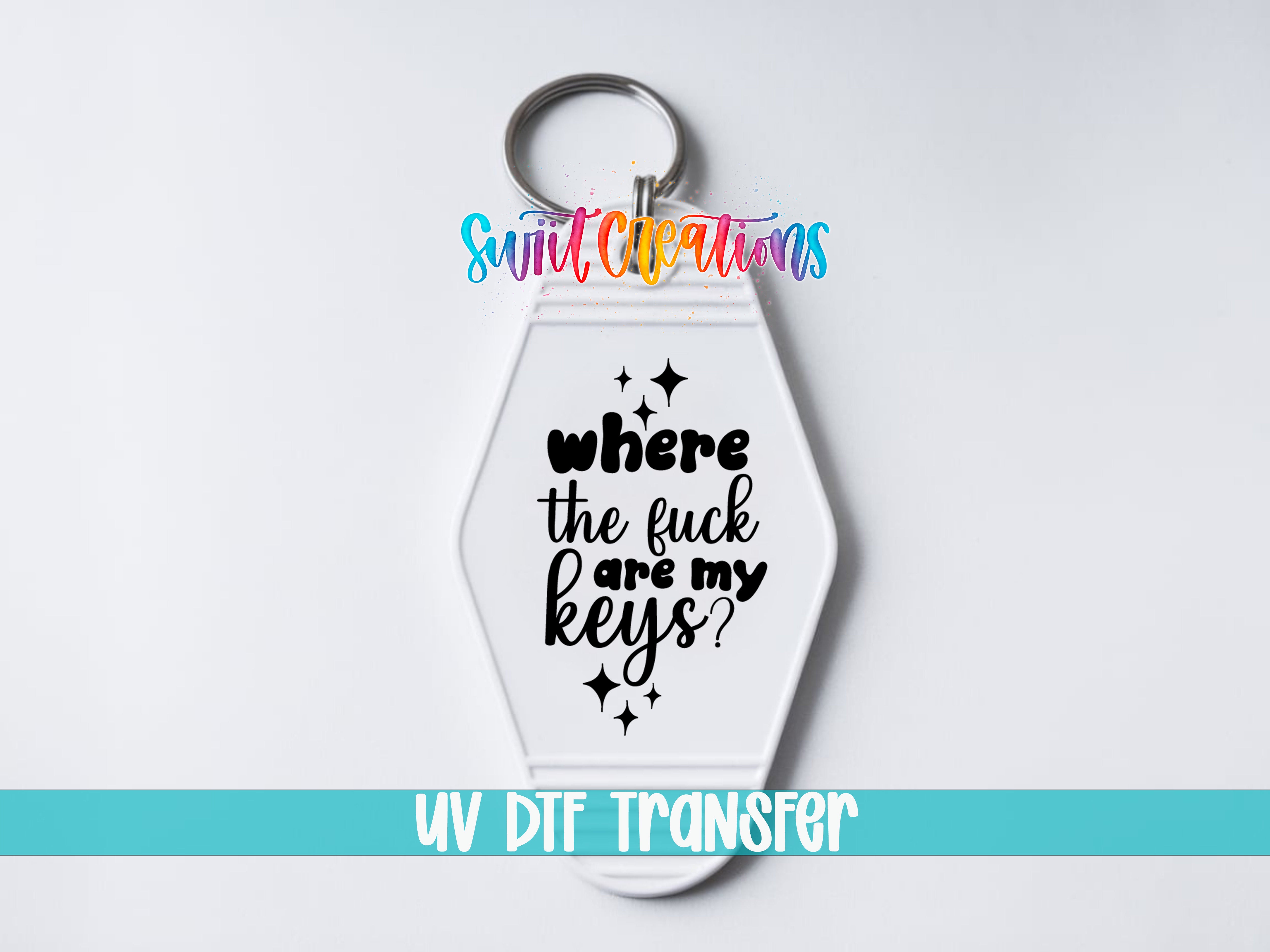 A keychain with a message printed on it, along with a logo and text indicating it is a UV DDF (Digital Print on Demand) transfer.