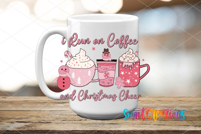 a white coffee mug with a pink design on it
