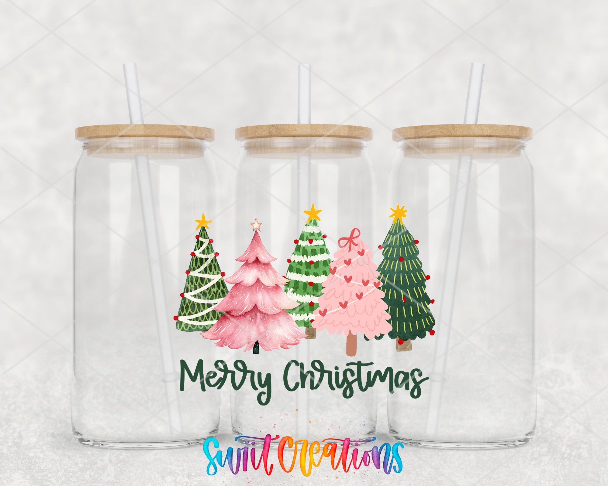 three plastic cups with christmas trees on them