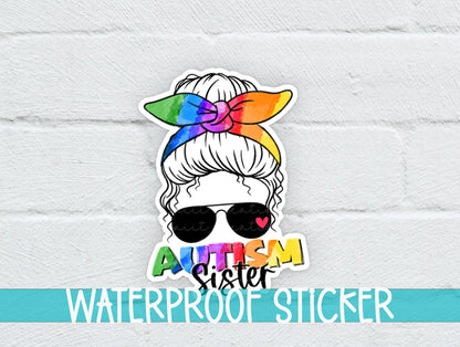 Autism Sister sticker on a white brick background with a waterproof sticker banner