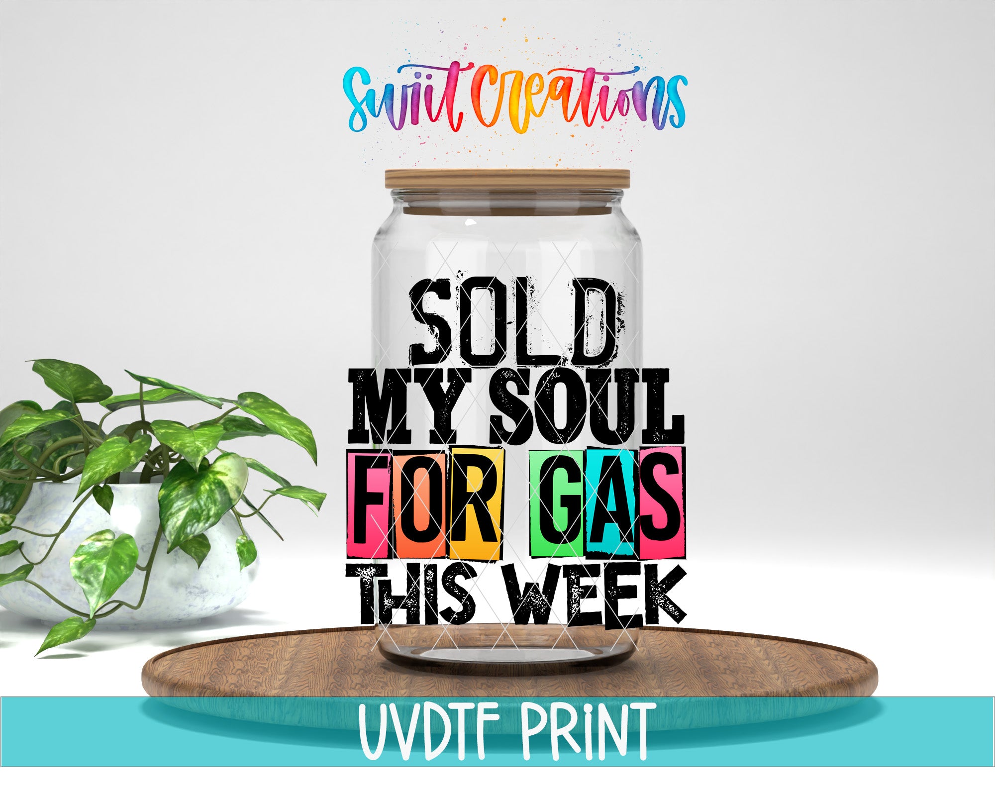 a large glass jar with a wooden lid, placed on a wooden tray. The jar has a colorful design and text printed on it, which reads "SOLD MY SOUL FOR GAS THIS WEEK". The background of the image is white, and there is a potted plant visible on the left side.