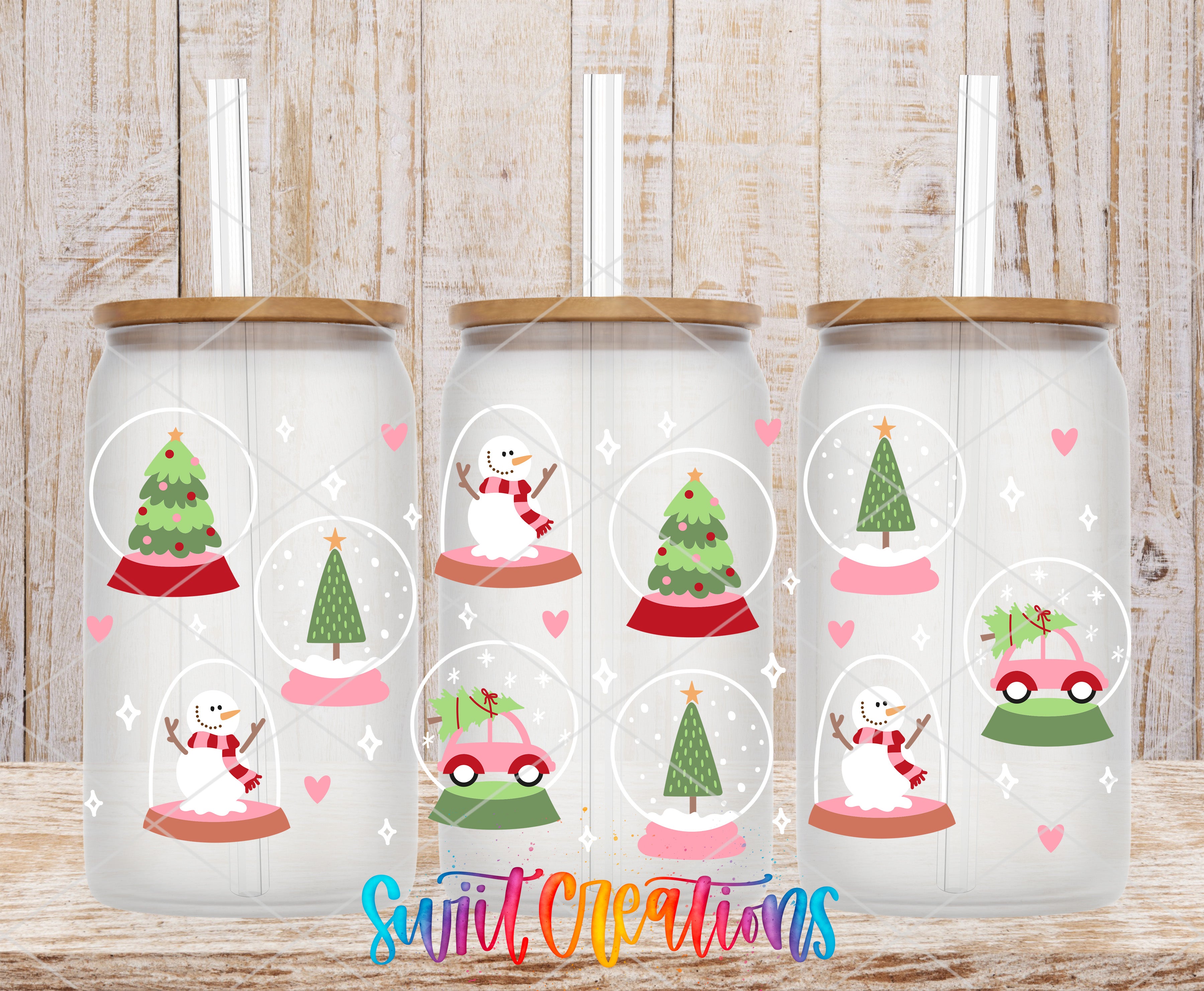 three christmas themed tumbles sitting on a table