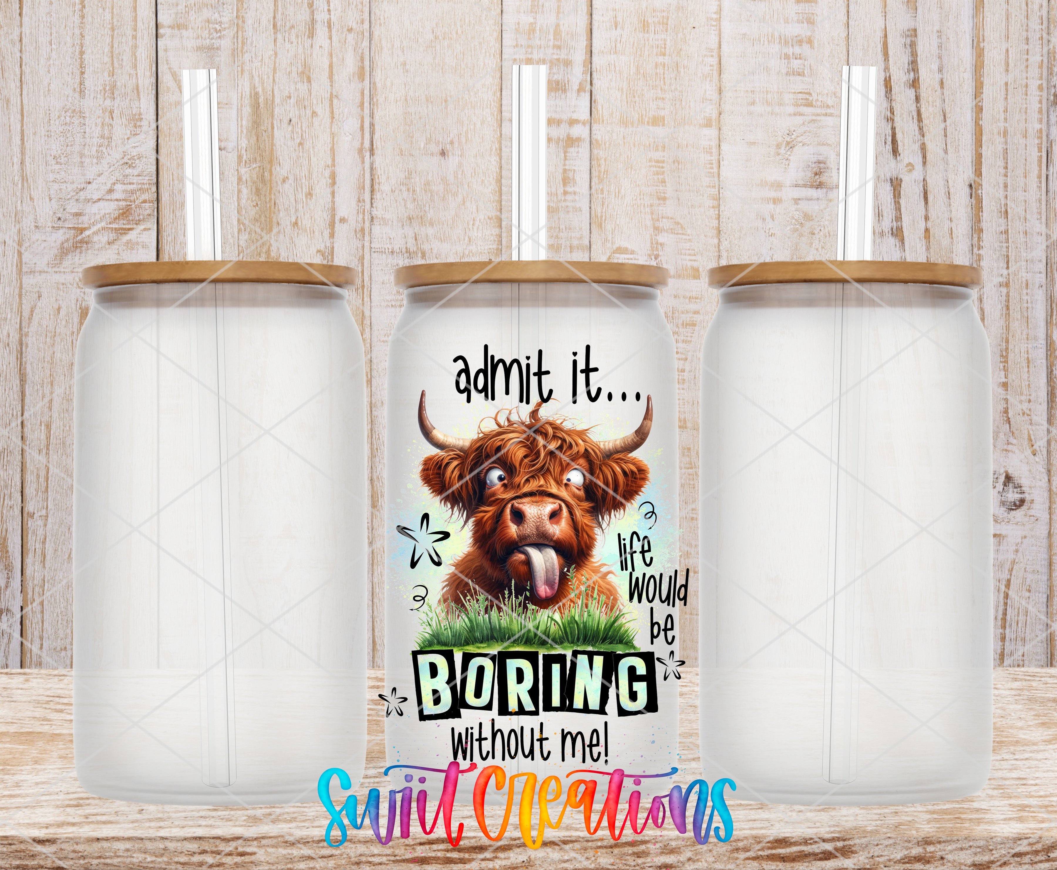 three clear glass jars with lids, each containing a straw. The jars are arranged in a row, with the middle jar having a colorful design featuring a cartoon cow with horns and a tongue sticking out. The design includes text that reads "admit it... life would be boring without me" and "suitable creations".