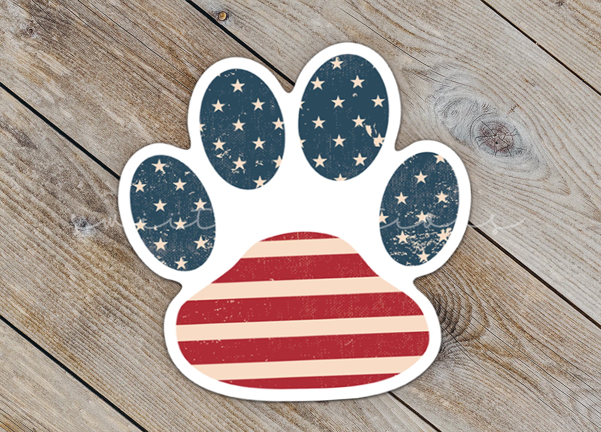 a sticker of an american flag paw print