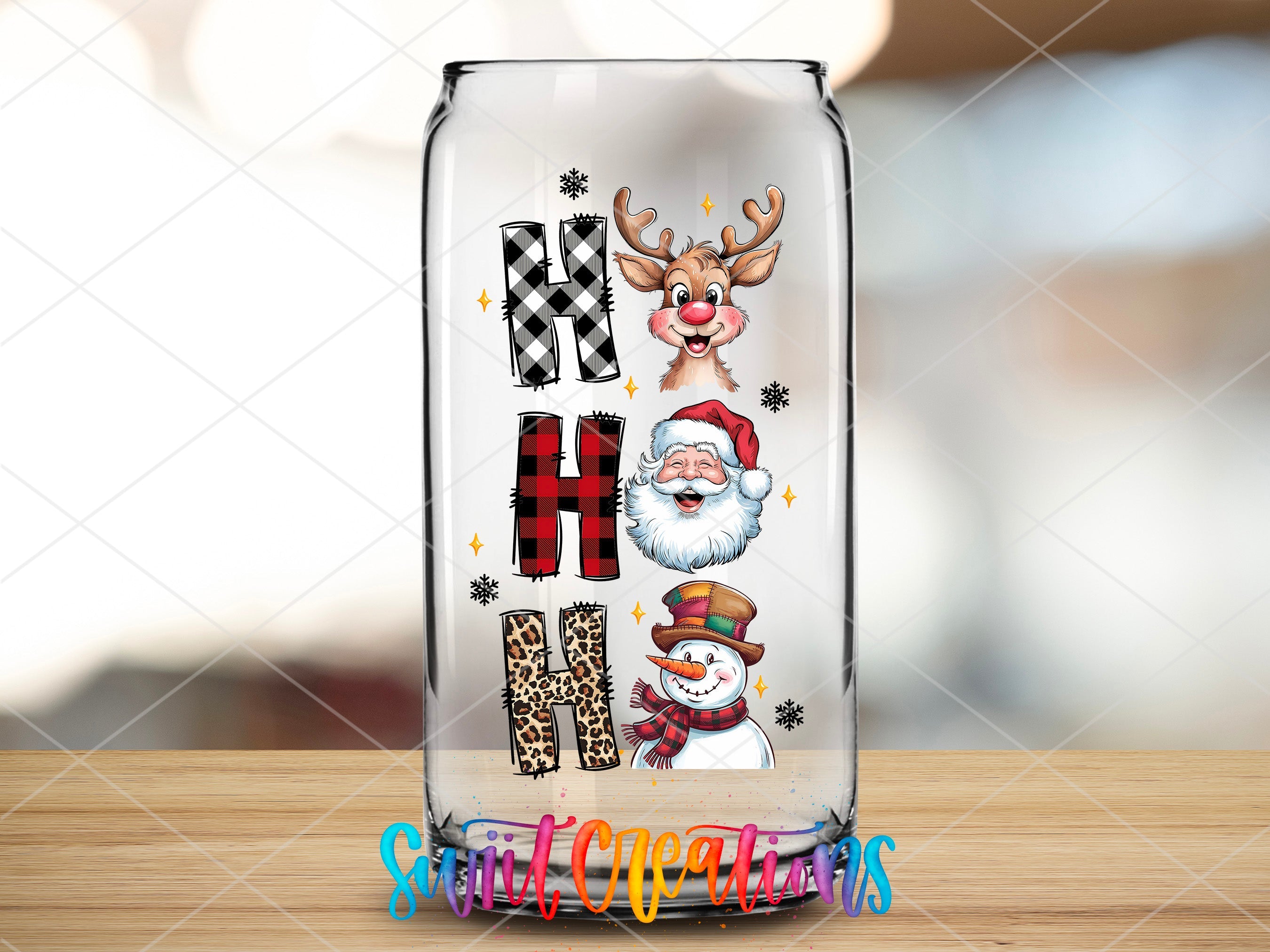a glass vase with a picture of santa claus