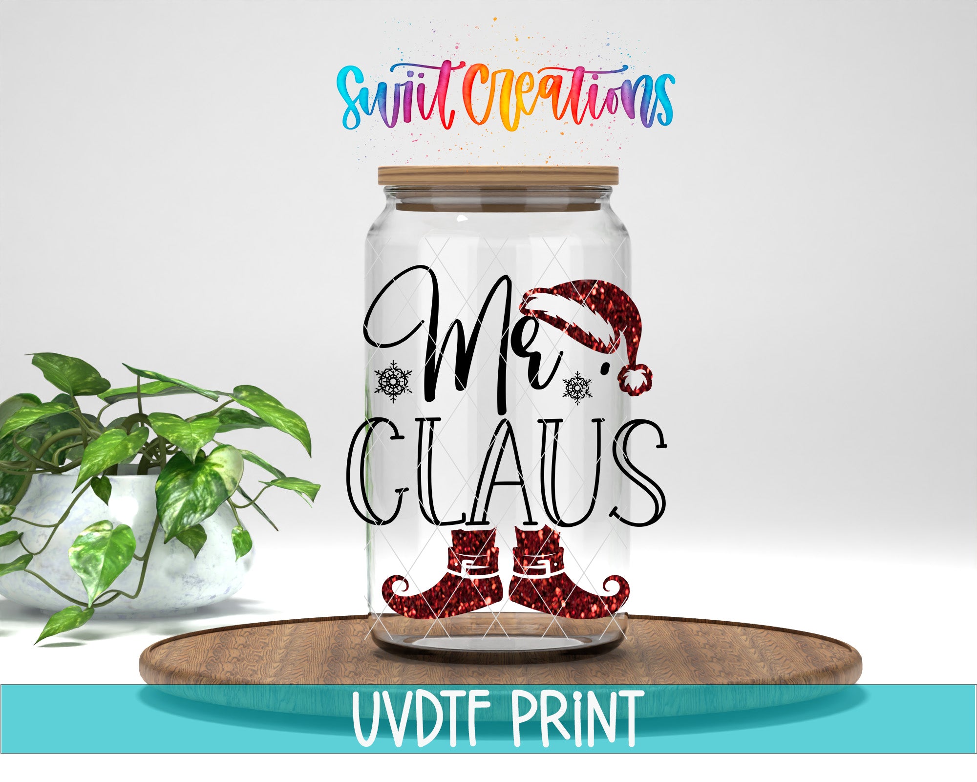 A clear glass jar with a label that says "Mr. Claus" and a Santa hat, placed on a wooden surface next to a potted plant.