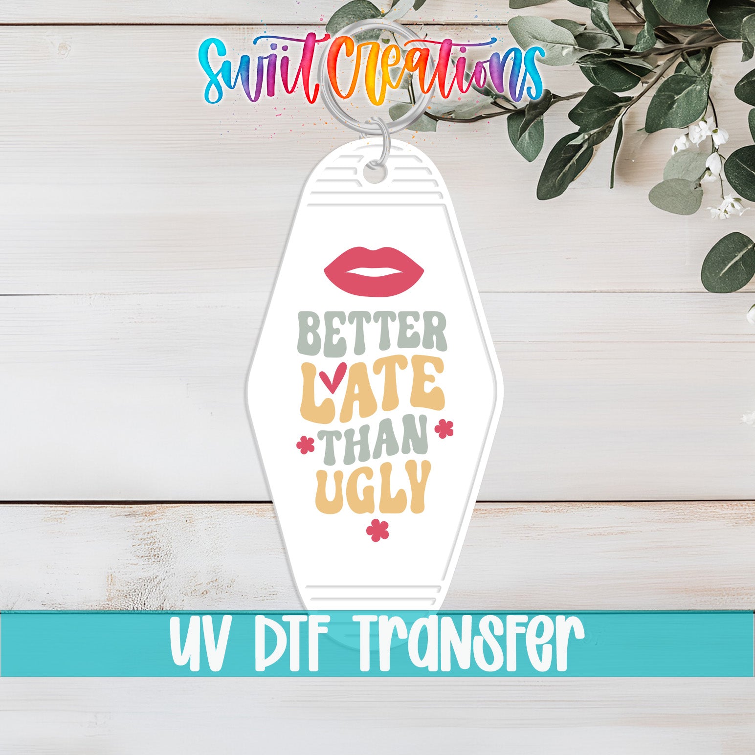 A keychain with the text "Better Late Than Ugly" printed on it, along with a graphic of a pair of lips.
