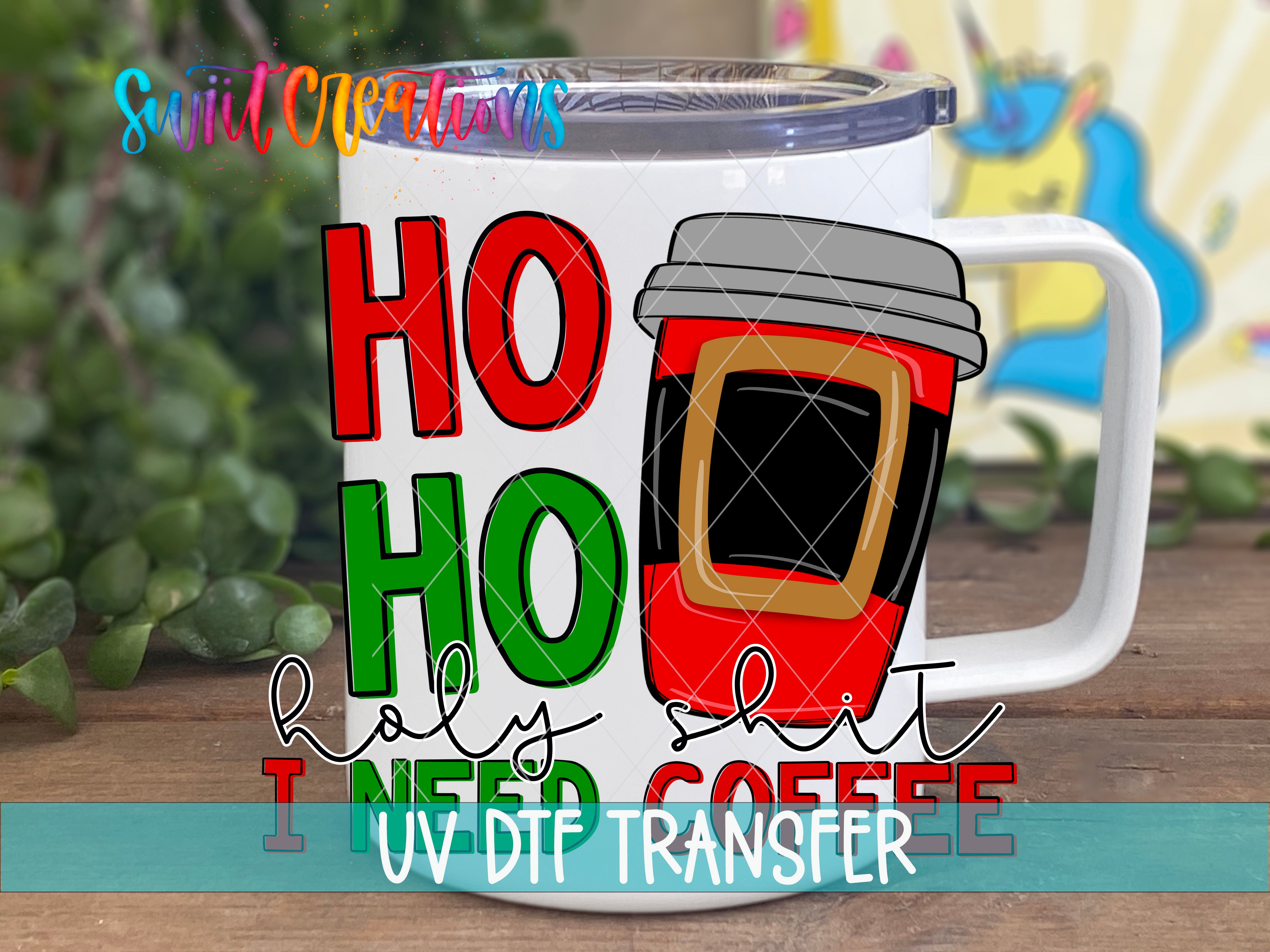 A white mug with a red coffee cup design and text printed on it, placed on a wooden surface.